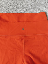 Load image into Gallery viewer, Orange lulu biker shorts!!
