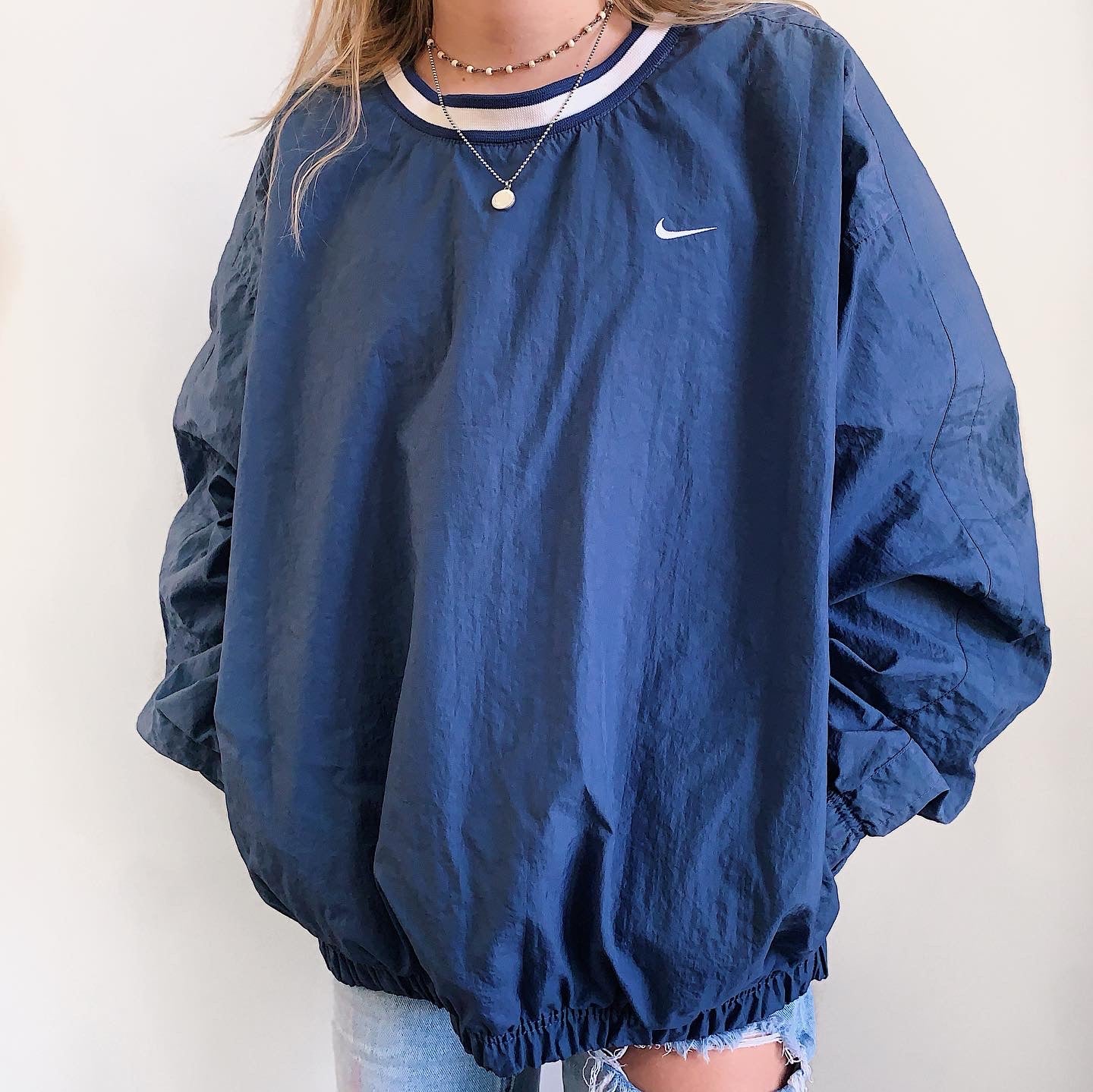 nike essentials windbreaker